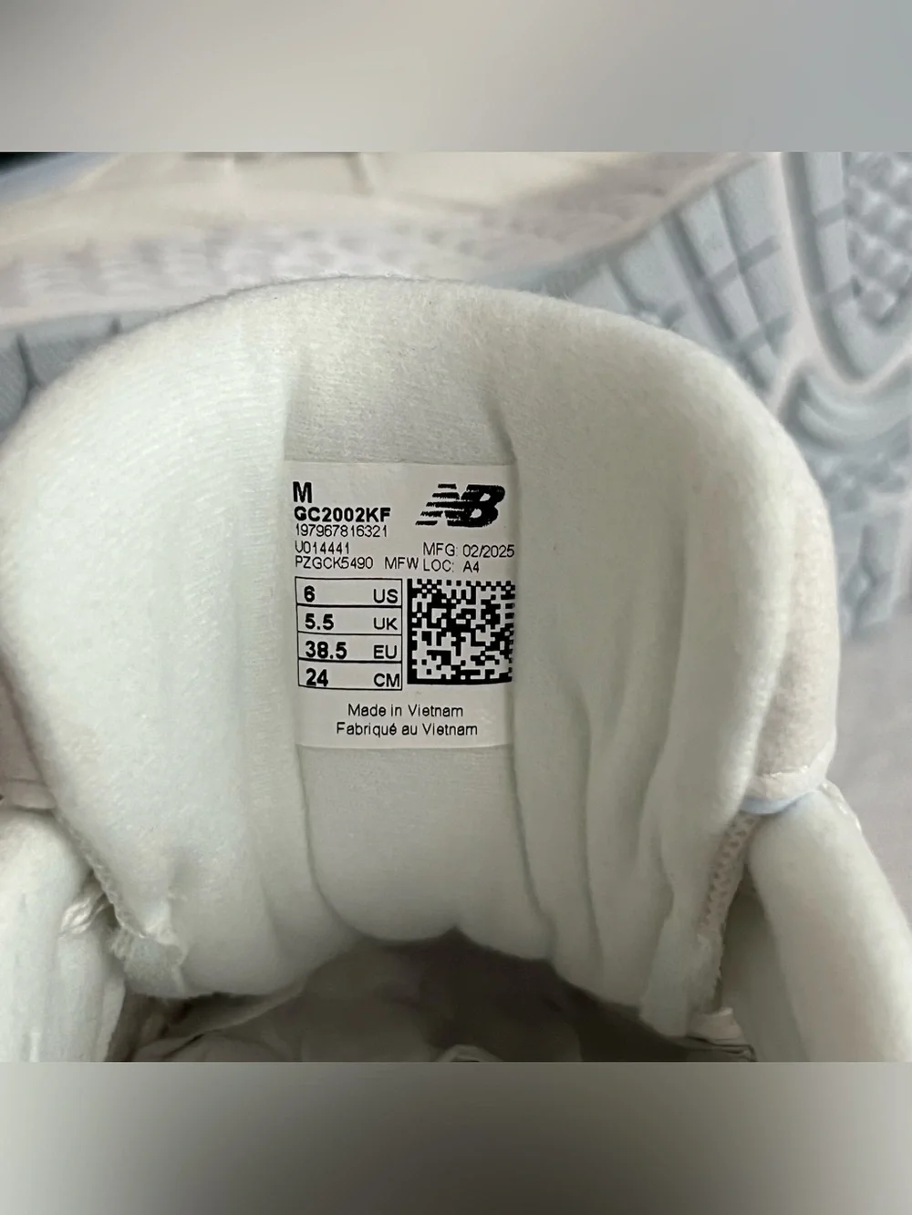 New Balance 2002 White Leather Sneakers with Pale Pink & Light Blue Accents